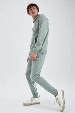 شلوار راحتی جاگر مردانه فیروزه ای دفاکتو