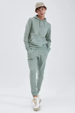 شلوار راحتی جاگر مردانه فیروزه ای دفاکتو