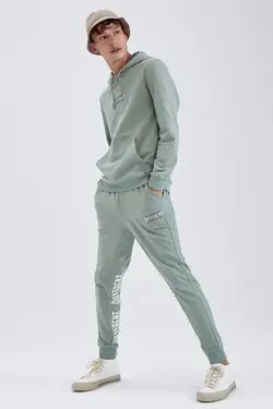 شلوار راحتی جاگر مردانه فیروزه ای دفاکتو