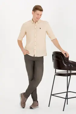 پیراهن مردانه آستین بلند ساده اسلیم فیت شتری یو اس پولو