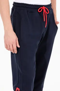 شلوار راحتی مردانه طرحدار دمپا کش سرمه ای یو اس پولو