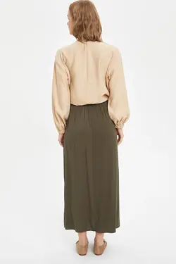 دامن زنانه خاکی دفاکتو