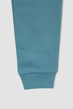 شلوار راحتی جاگر پسرانه فیروزه ای دفاکتو