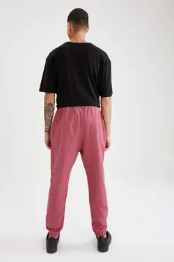 شلوار راحتی جاگر مردانه زرشکی دفاکتو