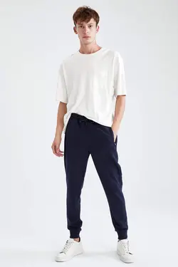 شلوار راحتی جاگر مردانه سرمه ای دفاکتو