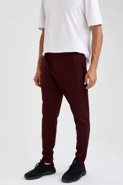 شلوار راحتی جاگر مردانه زرشکی دفاکتو