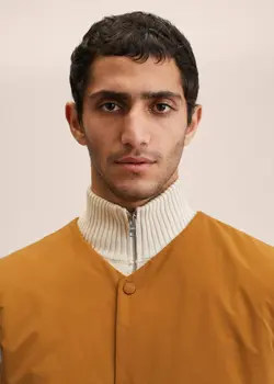پافر بدون آستین مردانه نارنجی منگو