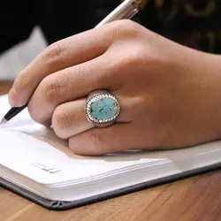 انگشتر فیروزه نیشابوری نقره دست ساز مردانه طرح فیلی دور چنگ