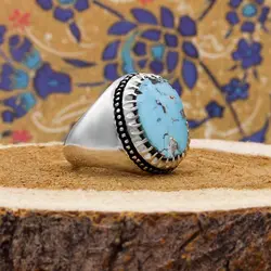 انگشتر فیروزه نیشابوری نقره دست ساز مردانه طرح فیلی دور چنگ