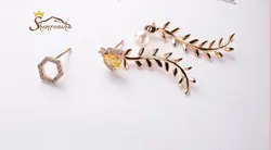 گوشواره نامتقارن سه تکه یونانی و مهره شش پر تمام کریستال اتریش گلد کد ۱۱۴۲۳