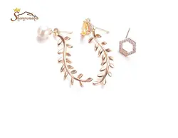 گوشواره نامتقارن سه تکه یونانی و مهره شش پر تمام کریستال اتریش گلد کد ۱۱۴۲۳