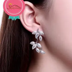 گوشواره لوکس مدرن  نامتقارن کوتاه بلند طرح برگ کریستال اتریش سیلور روکش پلاتین سیلور کد ۱۱۴۴۶