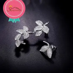 گوشواره لوکس مدرن  نامتقارن کوتاه بلند طرح برگ کریستال اتریش سیلور روکش پلاتین سیلور کد ۱۱۴۴۶