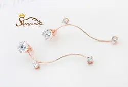 گوشواره مدرن طرح پیچک با آویز کریستال اتریش گلد کد ۹۶۶۵