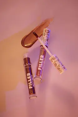 لیپ گلاس فیلر اینستینکت Filler Instinct Plumping Lip Polish مدل new money نیکس NYX