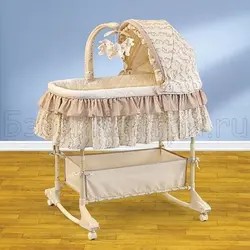 گهواره نوزادی سیمپلیسیتی اصل چهار کاره با کنترل و موزیکال و چراغ خواب رنگ کرم طرحدار جدید      Simplicity Baby Bassinet Cradle