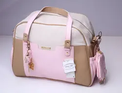 ساک لوازم نوزادی  چرم طبیعی اصل مایورال صورتی نسکافه ای با بند سردوشی لاکچری و زیرانداز تعویض و عایق دما و اکسسوری گلد مایورال اسپانیا    mayoral