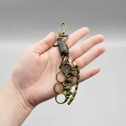 جاکلیدی اسکلتی طرح پنجه بوکس مدل 4Skulls کد Fkc831