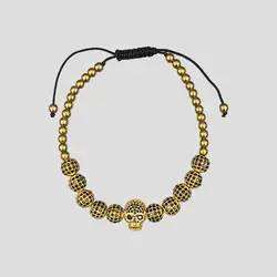 دستبند اسکلتی نگین دار مدل Gold Skulls کد Stdt419