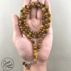 تسبیح 101 دانه سنگ طبیعی چشم ببر و عقیق زرد