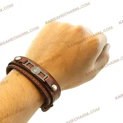 دستبند چرم طرح پلاک ورساچه نقره ای