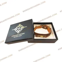 دستبند چرم طرح پلاک ورساچه طلایی