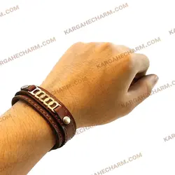 دستبند چرم طرح پلاک حلقه وصل (آئودی)