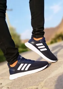 حراج استثنایی کفش کتونی اسپرت مردانه وپسرانه مدل اسپیسر ادیداس مناسب برای افراد خوش سلیقه سورمه ای سفید