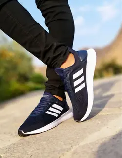 حراج استثنایی کفش کتونی اسپرت مردانه وپسرانه مدل اسپیسر ادیداس مناسب برای افراد خوش سلیقه سورمه ای سفید