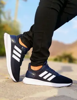 حراج استثنایی کفش کتونی اسپرت مردانه وپسرانه مدل اسپیسر ادیداس مناسب برای افراد خوش سلیقه سورمه ای سفید