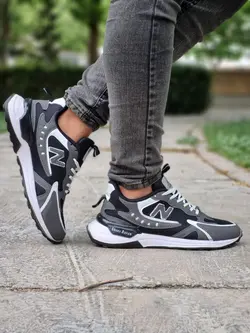 فروش ویژه کفش کتونی اسپرت مردانه مدل نیوبالانس فوق العاده جذاب و مدرن مشکی طوسی خط سفید