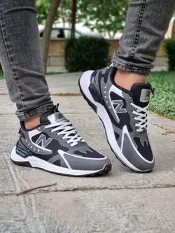 فروش ویژه کفش کتونی اسپرت مردانه مدل نیوبالانس فوق العاده جذاب و مدرن مشکی طوسی خط سفید