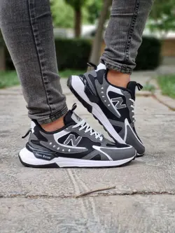 فروش ویژه کفش کتونی اسپرت مردانه مدل نیوبالانس فوق العاده جذاب و مدرن مشکی طوسی خط سفید