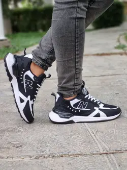 فروش ویژه این هفته کفش کتونی اسپرت مردانه پسرانه مدل نیوبالانس خاص وبروز و جذاب مشکی سفید