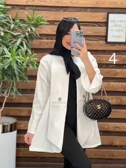 خرید اینترنتی مانتو ژاکارد مغزی دوزی کد 2444 فروشگاه ونوس مد