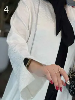 خرید اینترنتی مانتو ژاکارد مغزی دوزی کد 2444 فروشگاه ونوس مد