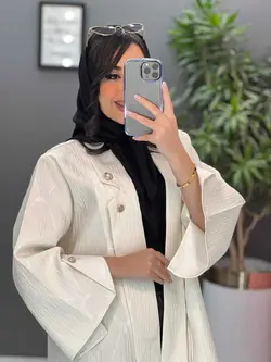 خرید اینترنتی مانتو ژاکارد یقه دکمه دار کد 2453 در ونوس مد