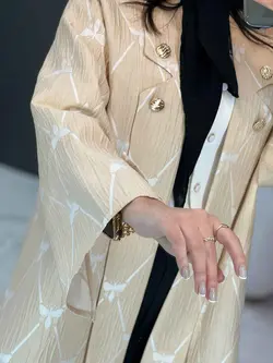 خرید اینترنتی مانتو ژاکارد یقه دکمه دار کد 2453 در ونوس مد