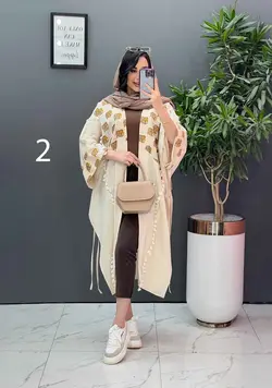 خرید اینترنتی مانتو لنین نچرال بلند طرح دوزی شده ونوس مد