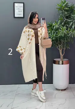 خرید اینترنتی مانتو لنین نچرال بلند طرح دوزی شده ونوس مد