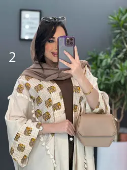 خرید اینترنتی مانتو لنین نچرال بلند طرح دوزی شده ونوس مد