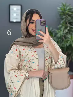 خرید اینترنتی مانتو لنین نچرال بلند طرح دوزی شده ونوس مد