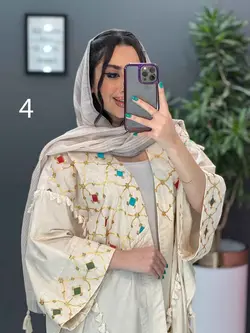 خرید اینترنتی مانتو لنین نچرال بلند طرح دوزی شده ونوس مد