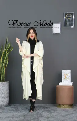 خرید اینترنتی و حضوری مانتو بلند بغل دکمه با پارچه خنک کریشه