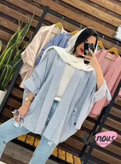 خرید اینترنتی مانتو پانچ راه راه جیب هلالی کد 1657در ونوس مد