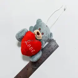 عروسک خرس نشسته قلبی