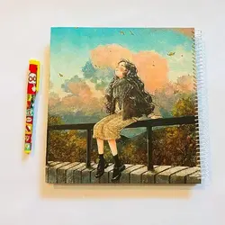 دفتر نقطه دار بزرگ دختر روی نرده