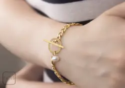 دستبند استیل کارتیر مروارید قفل تی