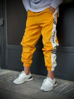 شلوار اسلش آدیداس خردلی