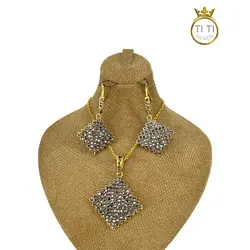 نیم ست استیل سیاه قلم طرح طلا - فروشگاه سیلور تی تی